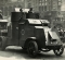 Food lorry with an armoured car escort